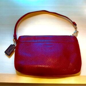 Coach Red Wine Pebbled Leather Wristlet